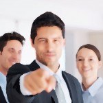 bigstock-Confident-business-man-pointin-21958307